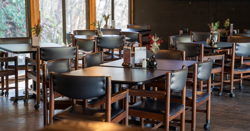 Interior, tables and chairs ready for guests