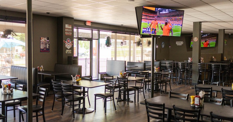Interior, tables and chairs in dining area