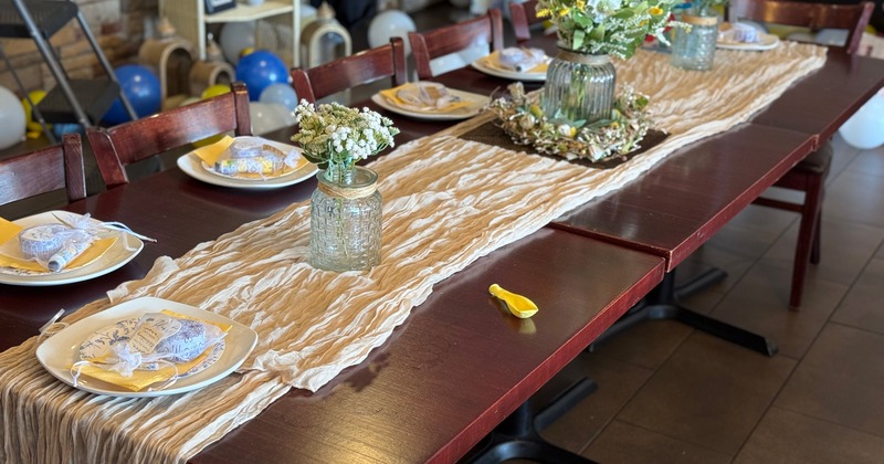 Dining table elegantly decorated and set for guests