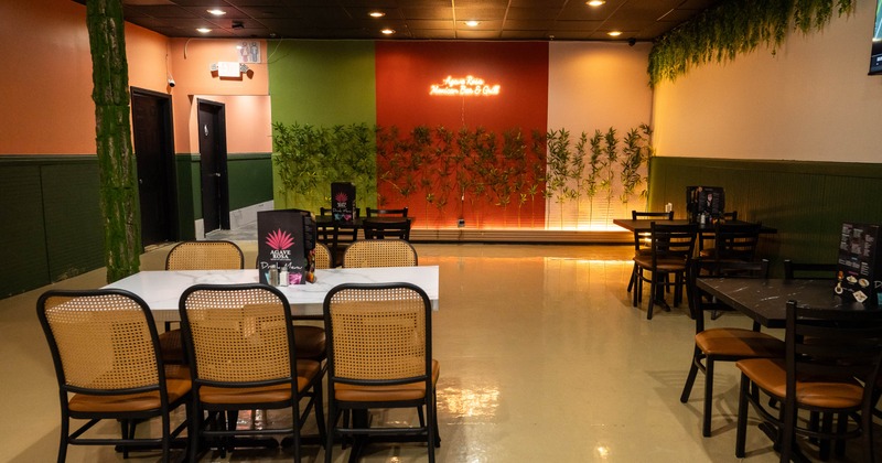 Interior, tables and chairs in dining area