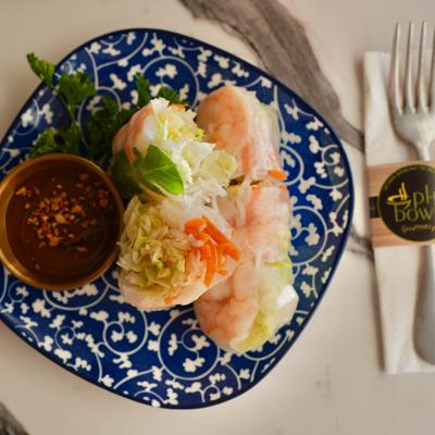 Shrimp Roll served with chili sauce, top view.