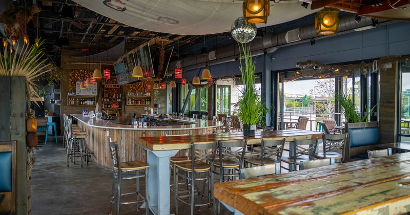 Interior, seating area, bar in the back