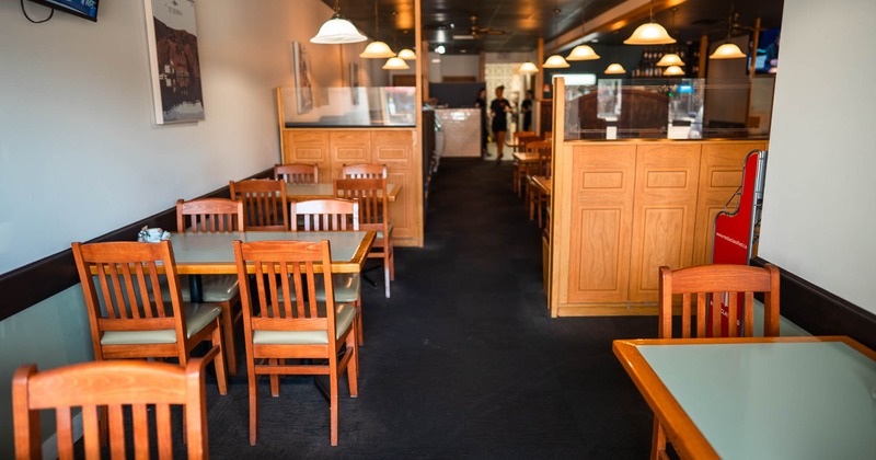 Dining space, tables ready for guests