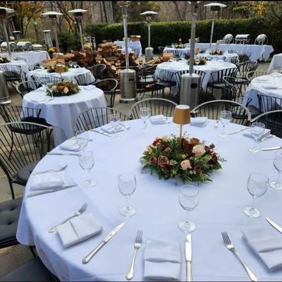 Set and decorated tables in the outdoor space for events