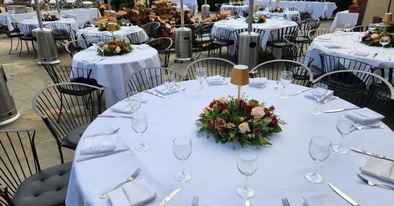 Set and decorated tables in the outdoor space for events
