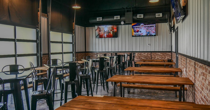 Interior space, seating area, TV sets on the wall