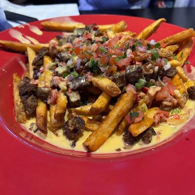 Fried loaded with steak, pico de gallo, and queso.