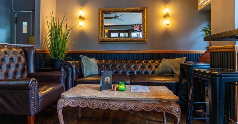 Interior seating area with leather sofas and armchairs