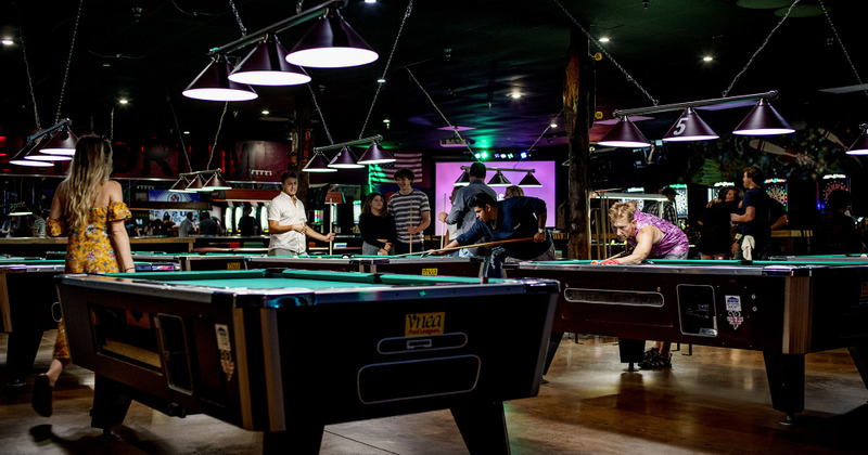 Interior, guests playing pool