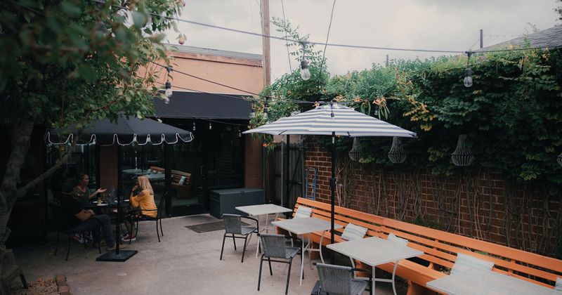 Exterior, patio, seating area with parasols
