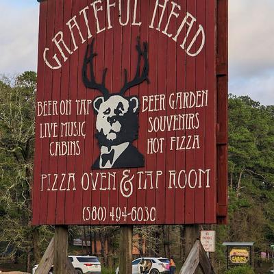 Exterior, restaurant signpost.