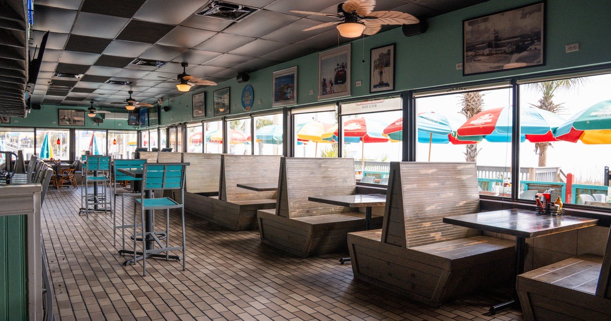 Interior, seating area with wooden booths and tables