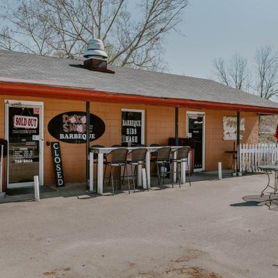 Restaurant exterior with front patio seating.