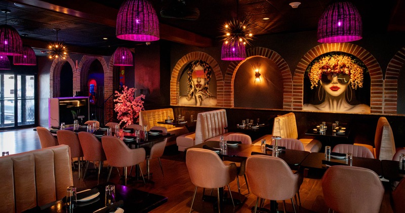 Interior, seating area with tables, chairs and booths