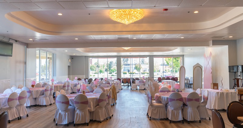 Room with banquet tables and chairs