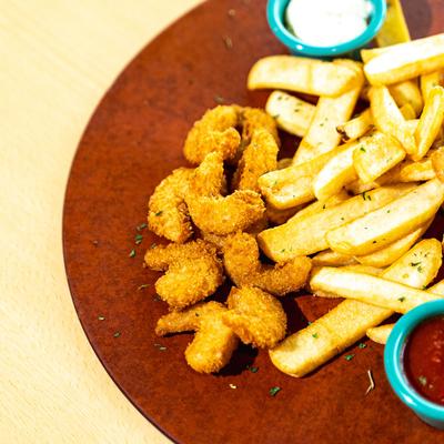 Deep fried shrimp, with fries and dipping sauces