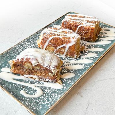 A plate with cinnamon bread.