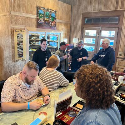 People socializing in a rustic cafe setting.