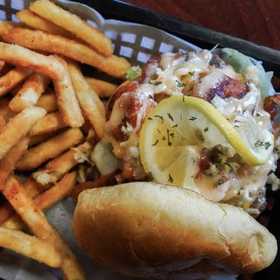 S.I.T.W Burger with fries.