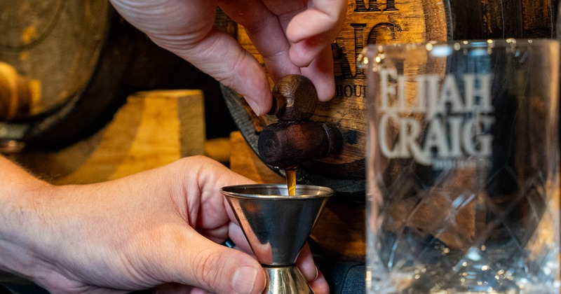 HAnds preparing a drink