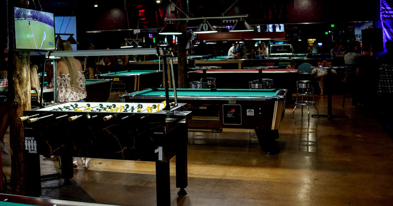 Interior, pool tables, table football and TV
