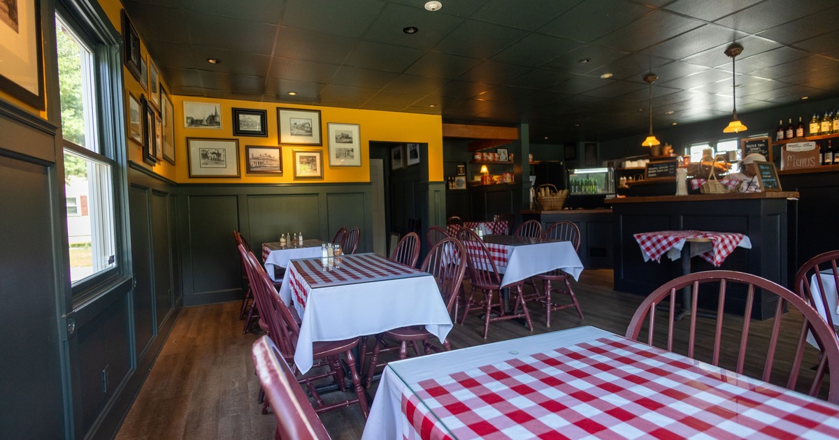 Interior, dining area with red and white checkered tablecloths