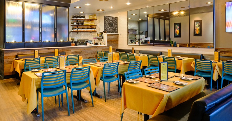 Interior, dining area with mirrors on the wall