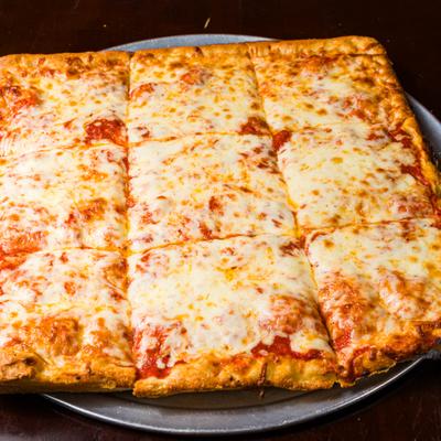 Sicilian house special pizza cut into squares.
