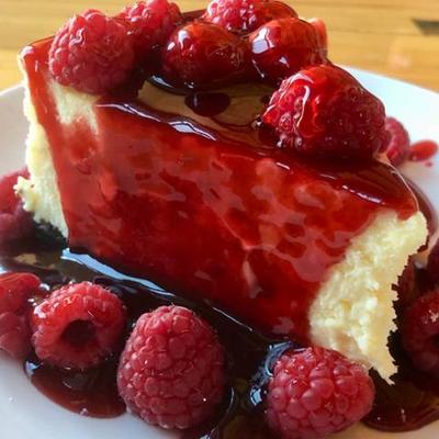 Cheesecake with Fresh Raspberry Sauce photo