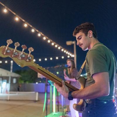 Guitar player performing.