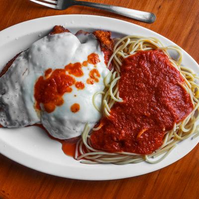 Spaghetti chicken parmesan, top view.