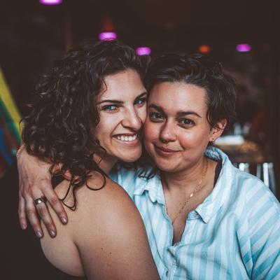 A couple of guests smiling, photo portrait