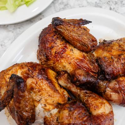 Roasted chicken pieces with crisp browned skin.