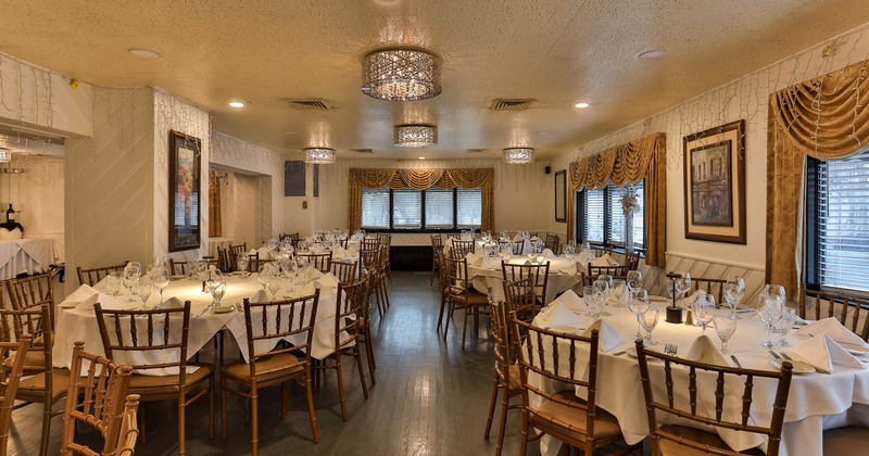 Interior, seating area with rounded tables and chairs