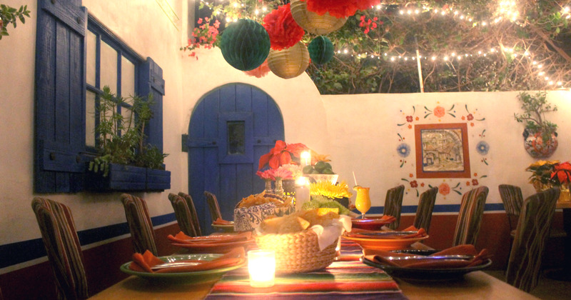 Outdoors seating area, night, lit candles
