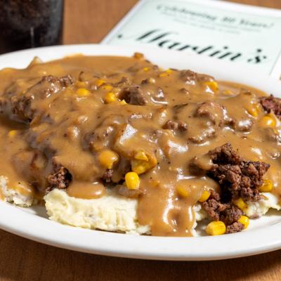 Shepherd's Pie, with mashed potatoes and gravy.