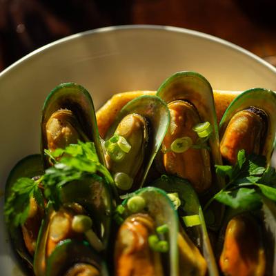 Mussels cooked  in coconut curry.
