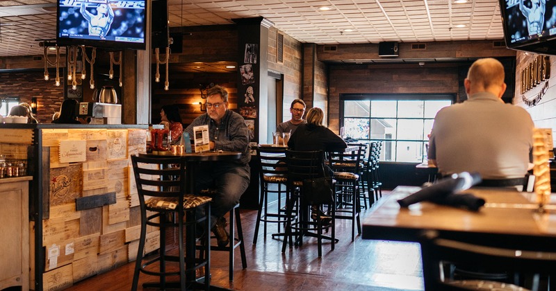 Interior, seating area, guests at tables