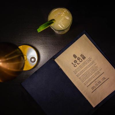 A top view of a drink and the menu.
