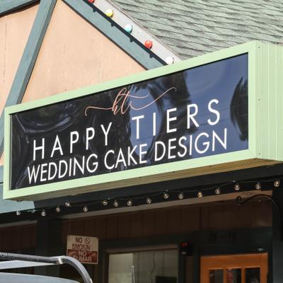 Exterior, Happy Tiers signage.