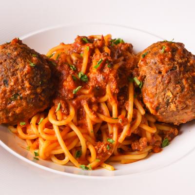Spaghetti and meatballs with rich tomato sauce.