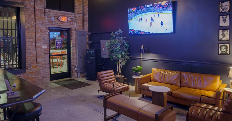 Interior, leather sofa,  two armchairs and coffee table