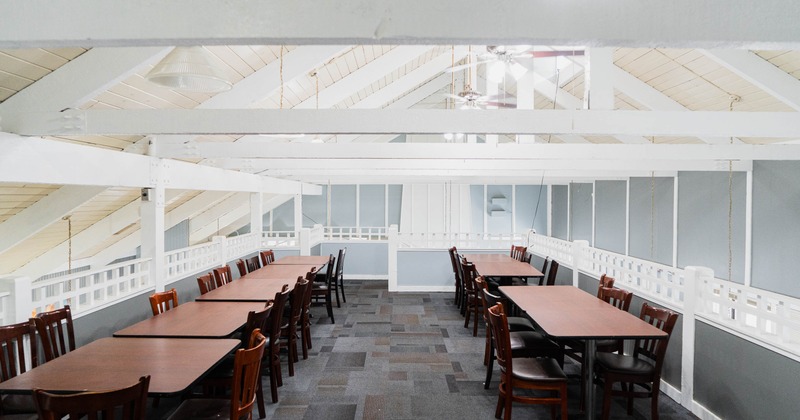 Interior, tables and chairs on the upper floor