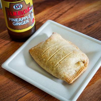 Apple Pie Patty served with a Jamaican pineapple ginger drink.