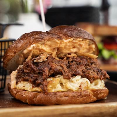 Pulled pork and mac and cheese sandwich.
