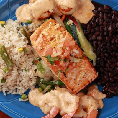 Captain's Skillet, seafood dish with black beans and rice on the side