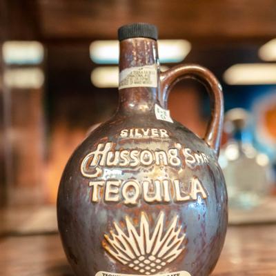 Bottle of Tequila served on the table.