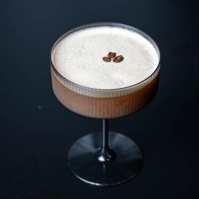Espresso Martini cocktail with coffee bean garnish.