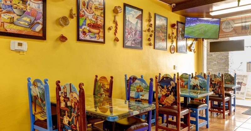 Interior, seating area with images on the wall