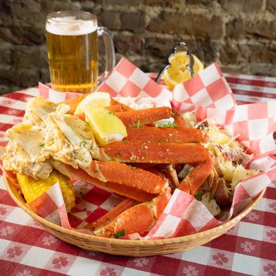 Snow Crab Feast served with a beer.
